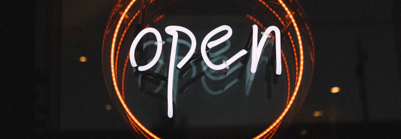 Neon sign reading "Open"